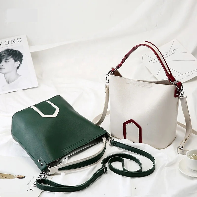 Wholesale spring and summer women wide strap contrast color fashion bucket PU handbags, Multi
Wholesale spring and summer women wide strap contrast color fashion bucket PU handbags, Multi