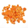 Orange color polyresin button for DIY hobby