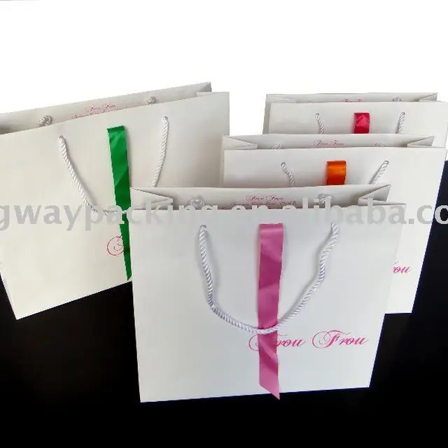 printed pink paper shopping gift bag with bow