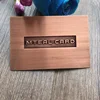Rose gold metal business card with custom company logo