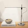 /product-detail/2016-modern-design-metal-magnetic-floating-led-desk-lamp-for-office-home-decoration-60550322252.html
