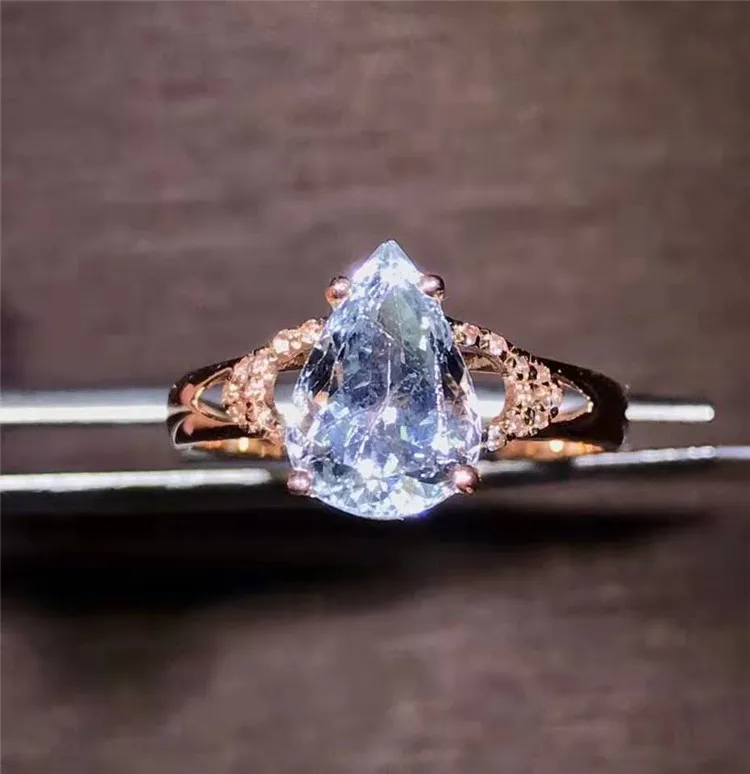 european fashion jewelry design 18k rose gold white sapphire 1.7ct aquamarine light blue natural gemstone ring for women
european fashion jewelry design 18k rose gold white sapphire 1.7ct aquamarine light blue natural gemstone ring for women