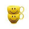 Factory supply yellow smile face ceramic coffee cup with handle