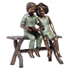 /product-detail/bronze-sculpture-garden-statue-girl-and-boy-sitting-on-a-bench-reading-books-bs279a-60104472703.html