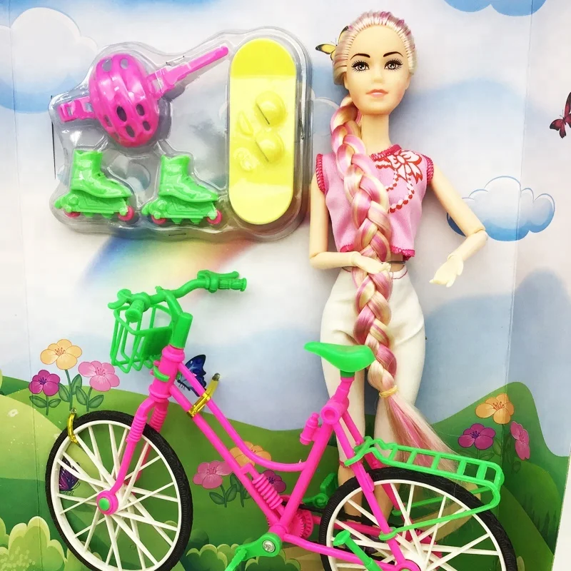 muñecas en bicicleta