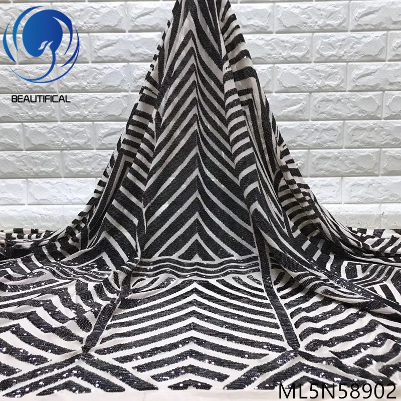 Beautifical heavy tulle french sequins lace black sequin fabric ML5N589, Can be customized
Beautifical heavy tulle french sequins lace black sequin fabric ML5N589, Can be customized