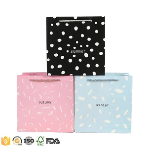 blue polka dot paper gift bags