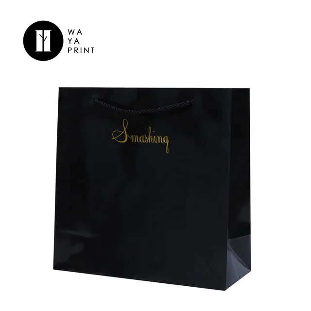 custom black apparel packaging paper bag with gold foil logo