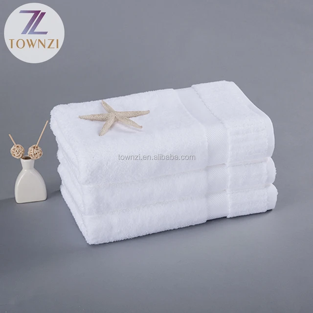 fashion cheap custom 100% cotton white compressed bath towel