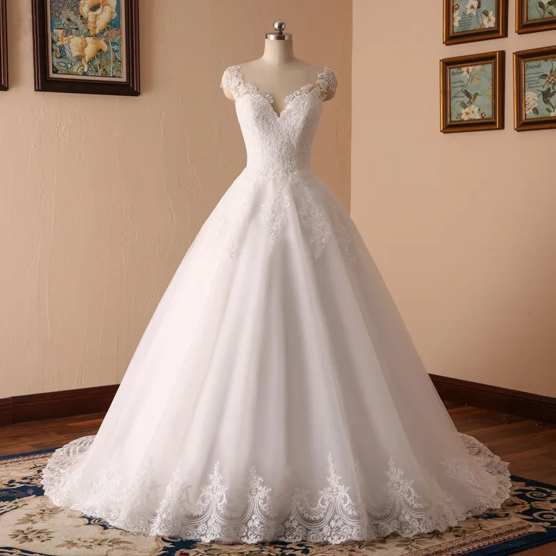 LS006 Sleeveless Illusion O-neck Lace A-line white wedding dress with 100cm tail, Off white;pure white
LS006 Sleeveless Illusion O-neck Lace A-line white wedding dress with 100cm tail, Off white;pure white