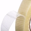 Thin rubber adhesive fiberglass reinforced adhesive mesh tape