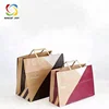 Small quantity in stocked white kraft paper bag wholesale price with your logo available 20*12*26cm
