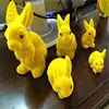 Top sale yellow resin rabbit flocked easter bunny