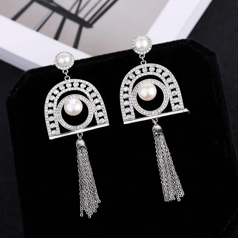 European and American retro eye earrings zircon pearl inlaid copper long tassel earring, Silver color
European and American retro eye earrings zircon pearl inlaid copper long tassel earring, Silver color