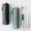 Colored leather cover pencil case for school students with zippered closure