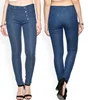 2019 fashion women blue mid-rise jegging jeans with a zip closure and button details on the front