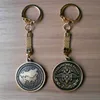 Russia antique bronze eagle and map coin size souvenir keychain