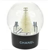 Factory custom glass souvenir snow globe high quality resin material 3D interior glass snow globe
