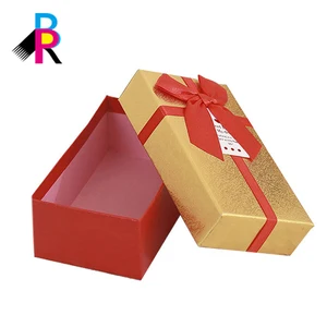 box with bowtie ribbon sparkle art paper attractive packaging