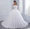 ZH2303G Glamorous Lace Long Sleeves Ball Gown Wedding Dresses Bateau Puffy Tulle Skirt Court Train Bridal Gown