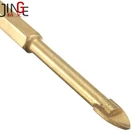 Hex shank titanium coated double cross masonry drill bit with flute