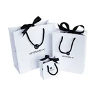 Wholesale Luxury Custom Printing White Shopping Packaging Small Paper Gift Bag With Your Own Logo