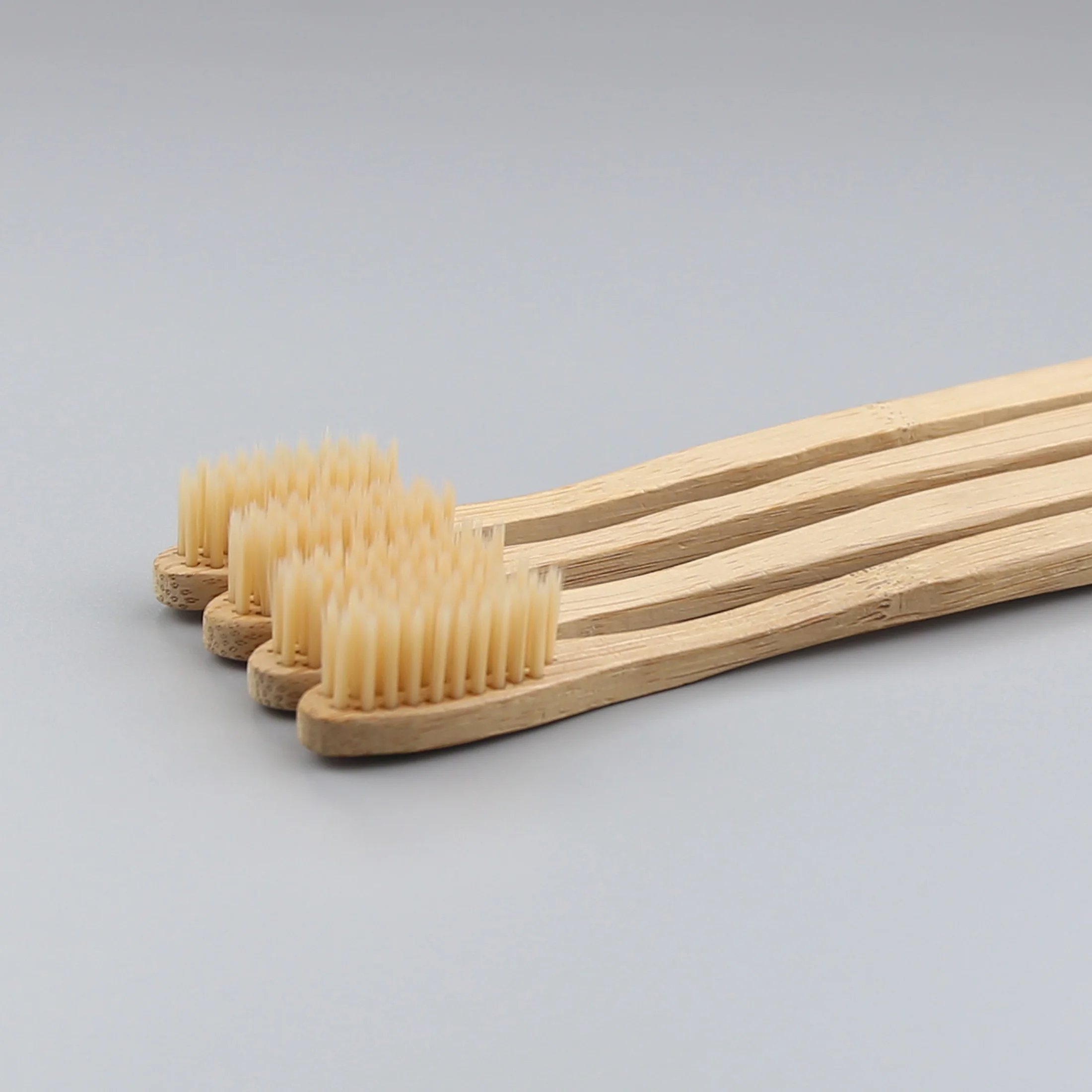 medium handle biodegradable eco bamboo toothbrush with soft tapered PBT brisltes, Pantone color 
medium handle biodegradable eco bamboo toothbrush with soft tapered PBT brisltes, Pantone color