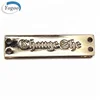 /product-detail/factory-price-sew-on-logo-engraved-gold-jeans-metal-clothing-labels-and-tags-60762121834.html
