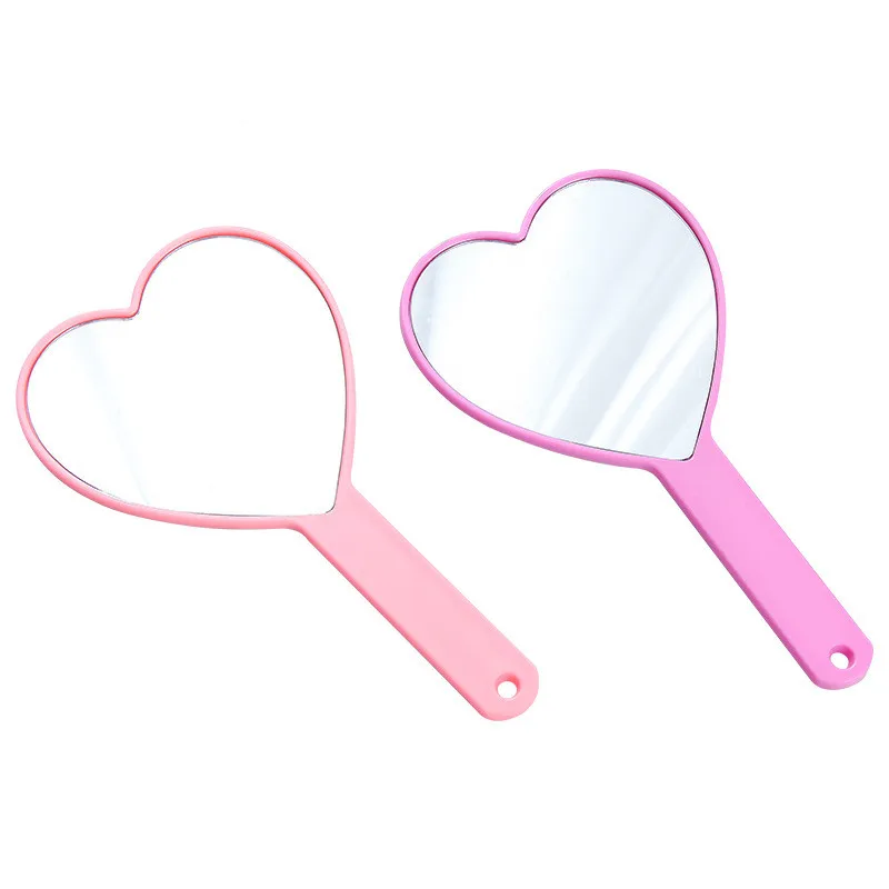 Manufacturers direct sales girl heart-shaped creative handle makeup mirror wholesale custom, Pink
Manufacturers direct sales girl heart-shaped creative handle makeup mirror wholesale custom, Pink