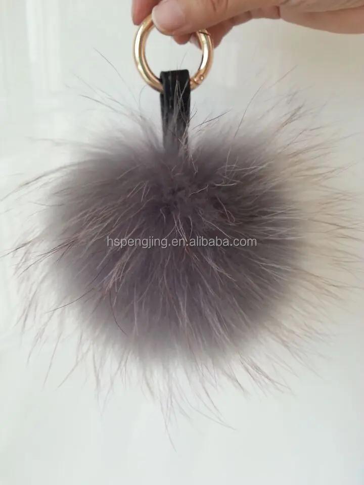 アライグマの毛皮ポンポンまみれ15cm鍵リング/装飾のためのバッグチャーム仕入れ・メーカー・工場