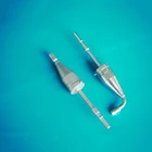 Air-assisted injection nozzle for straight through module