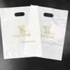 Factory Wholesale Glossy LDPE Fold Over Die Cut Handle Custom Retail Merchandise biodegradable plastic bags