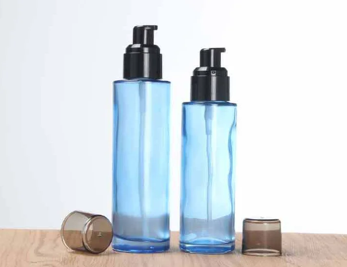 Wholesale 30ml 50ml 100ml transparent blue color Cosmetic packing bottle set bottle cream container for luxury skin care