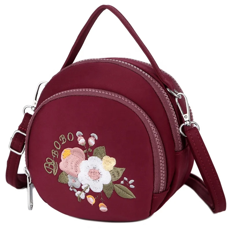 Girls new fashion leisure brief style round small shoulder handbag with embroidery wholesale
Girls new fashion leisure brief style round small shoulder handbag with embroidery wholesale