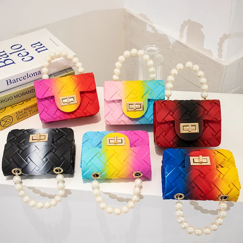Fashionable pearl rainbow colorful jelly kid purses and handbags little girls mini bags for girls and boys 2021
Fashionable pearl rainbow colorful jelly kid purses and handbags little girls mini bags for girls and boys 2021