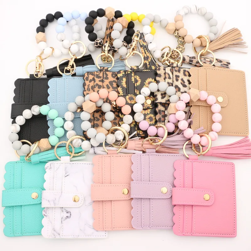 Silicone Bead PU Bracelet Card Holder Purse Leopard Print Tassel Wallet Leather Keychain, Picture shows
Silicone Bead PU Bracelet Card Holder Purse Leopard Print Tassel Wallet Leather Keychain, Picture shows
