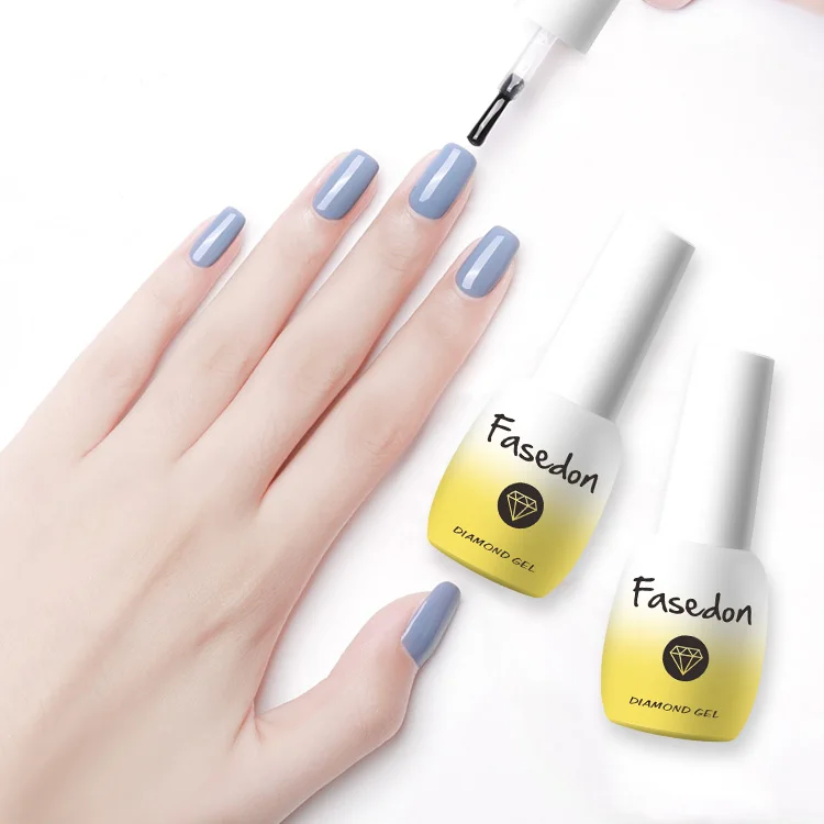 Fasedon Brand 15ml yellow bottle diamond gloss gel top Coat private label top coat gel polish, Diamond top coat
Fasedon Brand 15ml yellow bottle diamond gloss gel top Coat private label top coat gel polish, Diamond top coat