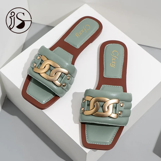 The latest fashion slippers Flat-bottomed slippers with metal buttons A popular new design for women Hot selling slides, Picture
The latest fashion slippers Flat-bottomed slippers with metal buttons A popular new design for women Hot selling slides, Picture