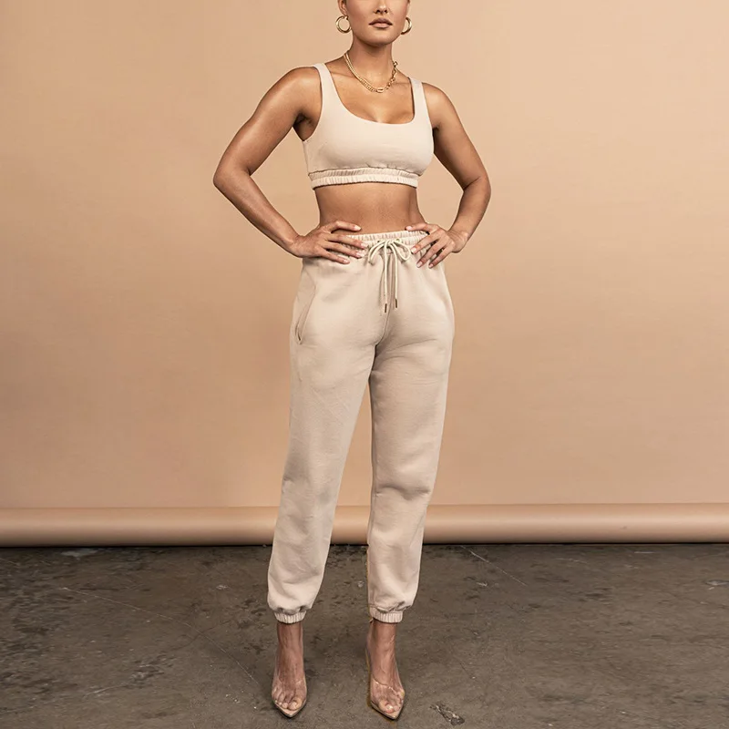 MOQ 1 Set Spring Summer Trendy Solid Color Casual Streetwear Sports Cotton Tank Top & Pants Set Women Two Piece Pants Set
MOQ 1 Set Spring Summer Trendy Solid Color Casual Streetwear Sports Cotton Tank Top & Pants Set Women Two Piece Pants Set