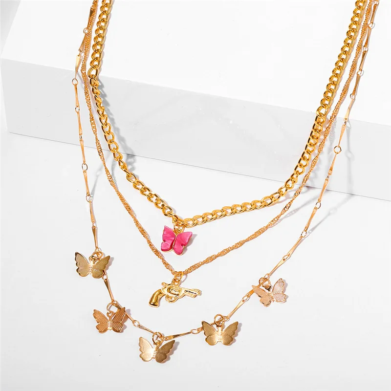 Women Alloy Pendant Necklace Gun Necklace Colar Multi Layer Gold Plated Cuban Chain Crystal Butterfly Necklaces Choker
Women Alloy Pendant Necklace Gun Necklace Colar Multi Layer Gold Plated Cuban Chain Crystal Butterfly Necklaces Choker