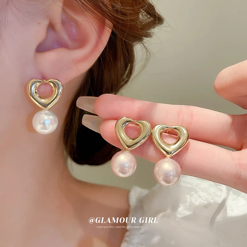 Korean Pearl Big Hollow Love Heart Dangle Jewelry Girl Simple Statement Pink White Pearl Earrings For Women
Korean Pearl Big Hollow Love Heart Dangle Jewelry Girl Simple Statement Pink White Pearl Earrings For Women