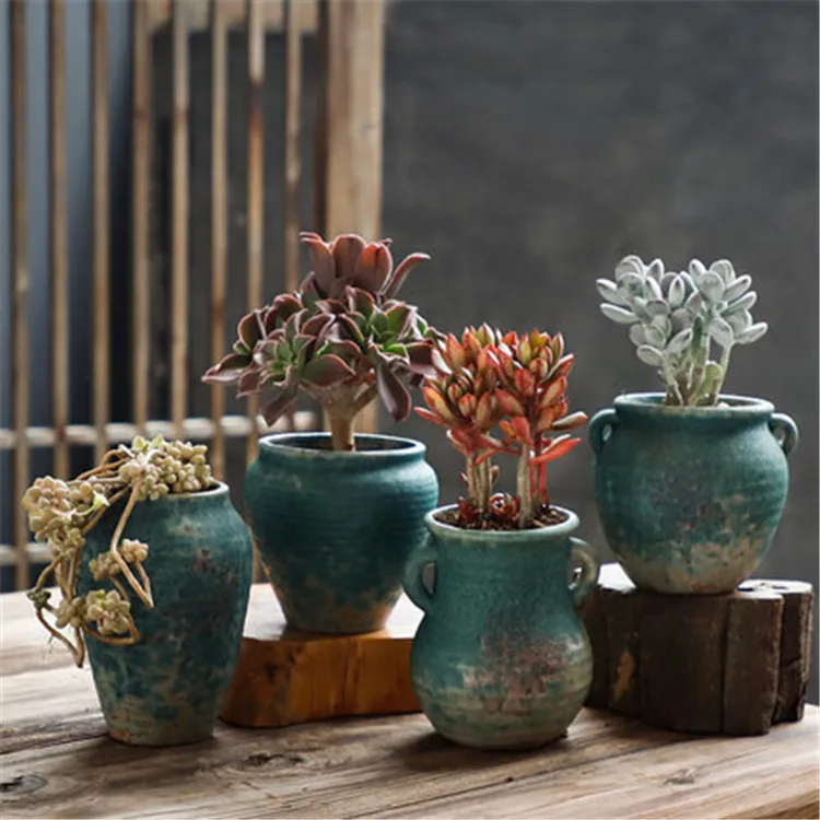 New design handmade coloured coarse pottery breathable personality creative decor flower pot
New design handmade coloured coarse pottery breathable personality creative decor flower pot