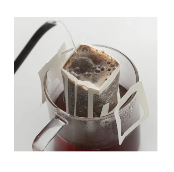 50pcs Traveling Eco-friendly Material Food Grade Ear Non-woven fabric Hanging Drip Bag Coffee Filter
50pcs Traveling Eco-friendly Material Food Grade Ear Non-woven fabric Hanging Drip Bag Coffee Filter