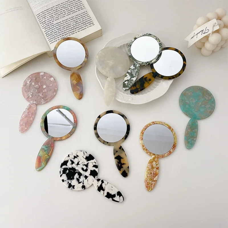 New popular portable oval hand mirror make up case in acetate quality with handle for women girl daily decoration, Customized color
New popular portable oval hand mirror make up case in acetate quality with handle for women girl daily decoration, Customized color