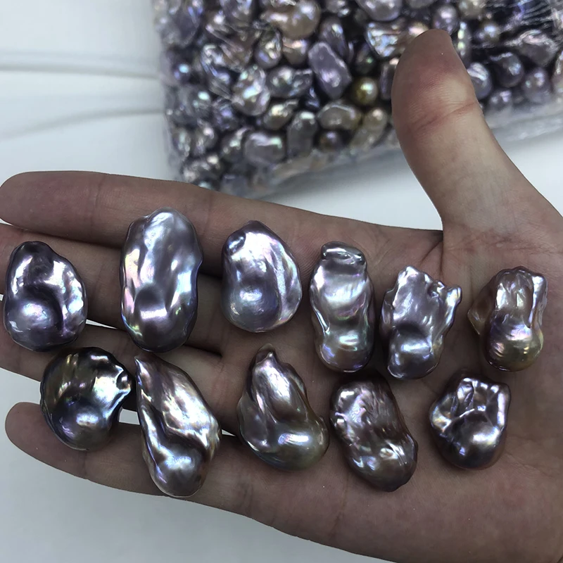 wholesale 18-20mm high quality big purple natural baroque pearl loose,good luster,blemish free surface
wholesale 18-20mm high quality big purple natural baroque pearl loose,good luster,blemish free surface