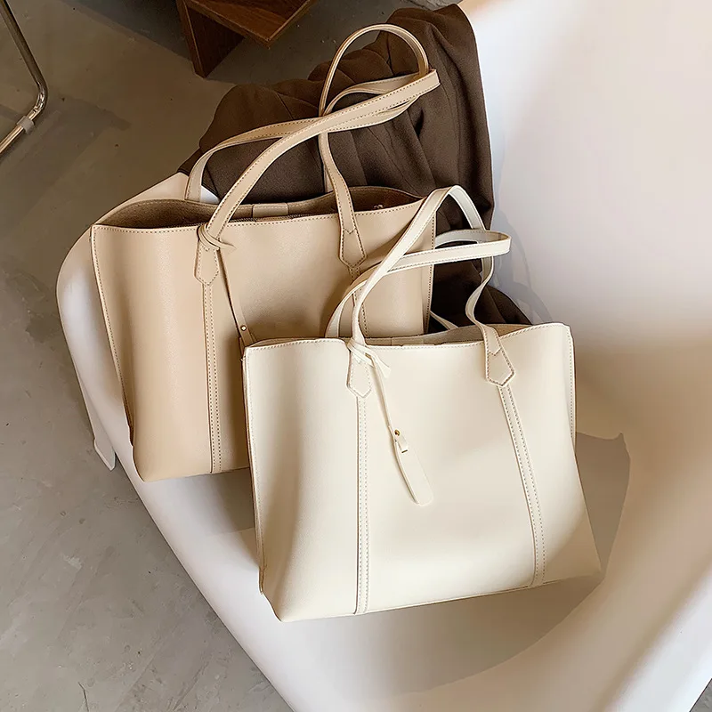 2021 New PU material simple large capacity single shoulder bag wholesale girls shopping handbags
2021 New PU material simple large capacity single shoulder bag wholesale girls shopping handbags