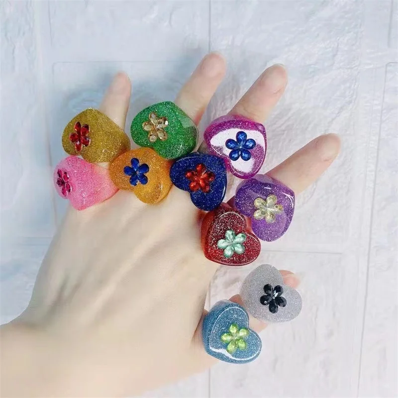 CLARMER Korean version of the new resin flower color diamond love heart glitter sequin ring for woman and girls, Picture shows
CLARMER Korean version of the new resin flower color diamond love heart glitter sequin ring for woman and girls, Picture shows