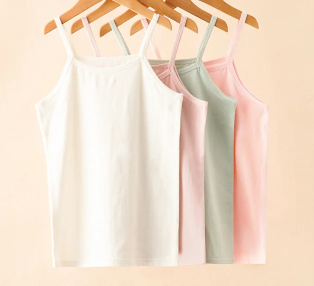Ivy40085A Summer 2020 cotton fabric kids tank top girl kids candy color sleeveless vest top children's plan t shirt
Ivy40085A Summer 2020 cotton fabric kids tank top girl kids candy color sleeveless vest top children's plan t shirt