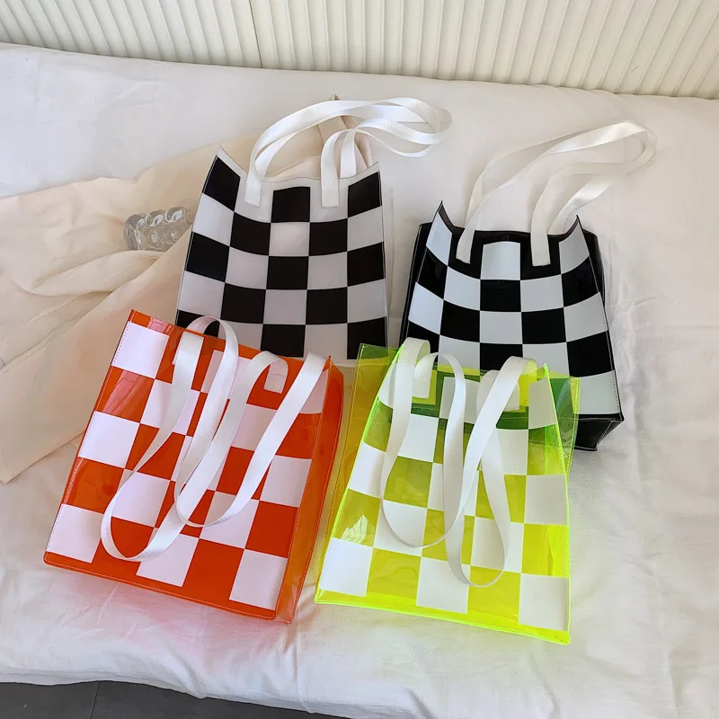 Wholesale Transparent Clear PVC Checkerboard Handbag Summer Beach Fashion Jelly Tote Beach Waterproof Shopping Bag, Customized color
Wholesale Transparent Clear PVC Checkerboard Handbag Summer Beach Fashion Jelly Tote Beach Waterproof Shopping Bag, Customized color