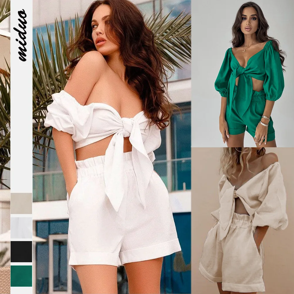 Trendy 2022 New Women's Two Piece Set Solid Color Lantern Middle Sleeve Lace Up Top Wide Leg Pocket Shorts Casual Suit
Trendy 2022 New Women's Two Piece Set Solid Color Lantern Middle Sleeve Lace Up Top Wide Leg Pocket Shorts Casual Suit